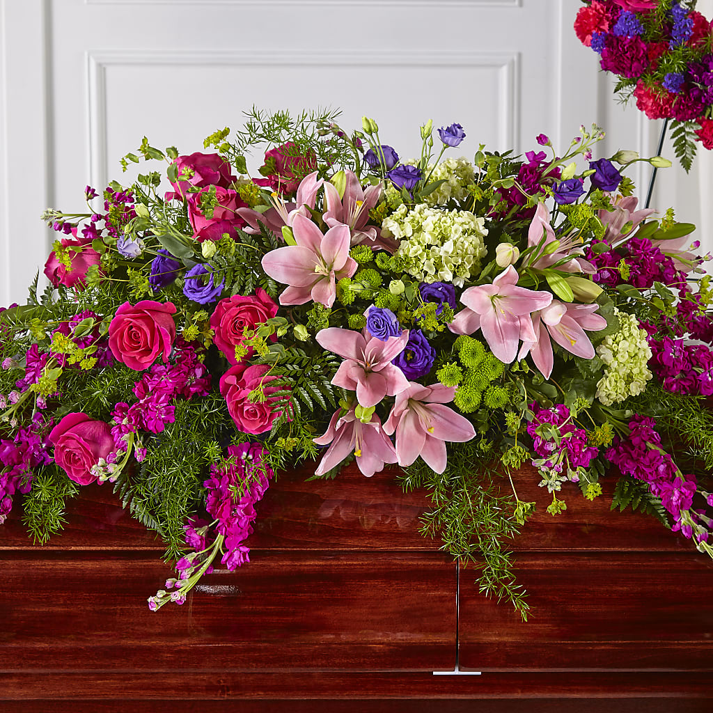 Radiant Tribute Casket Spray – HALL'S GIFT AND TREASURES FLORAL DESIGN, Vicksburg MS