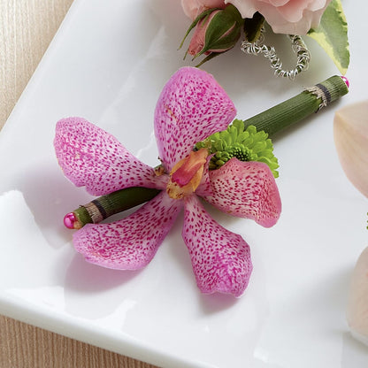 Pink Mokara Boutonniere – HALL'S GIFT AND TREASURES FLORAL DESIGN, Vicksburg MS